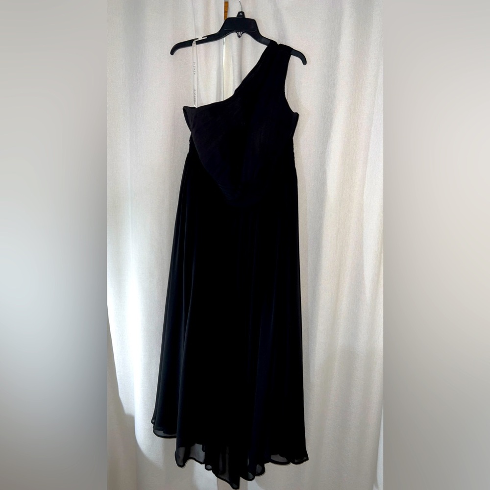 Used altered black bridesmaid dress. Length 37 in., waist 40 in. & breast 42 in.